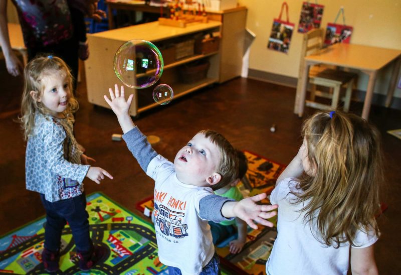 Students of the Barrington Village Enrichment Center discover the magic of bubbles. (Photo by Cheryl Senter.)